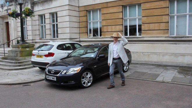 The groom arrives at Wandsworth Town Hall, hoping fora sunny day